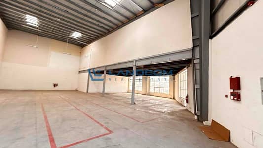 Warehouse for Rent in Dubai Investments Park (DIP), Dubai - Road-Facing Warehouse for Lease|15 kW Power | Ideal for Warehousing & Logistics