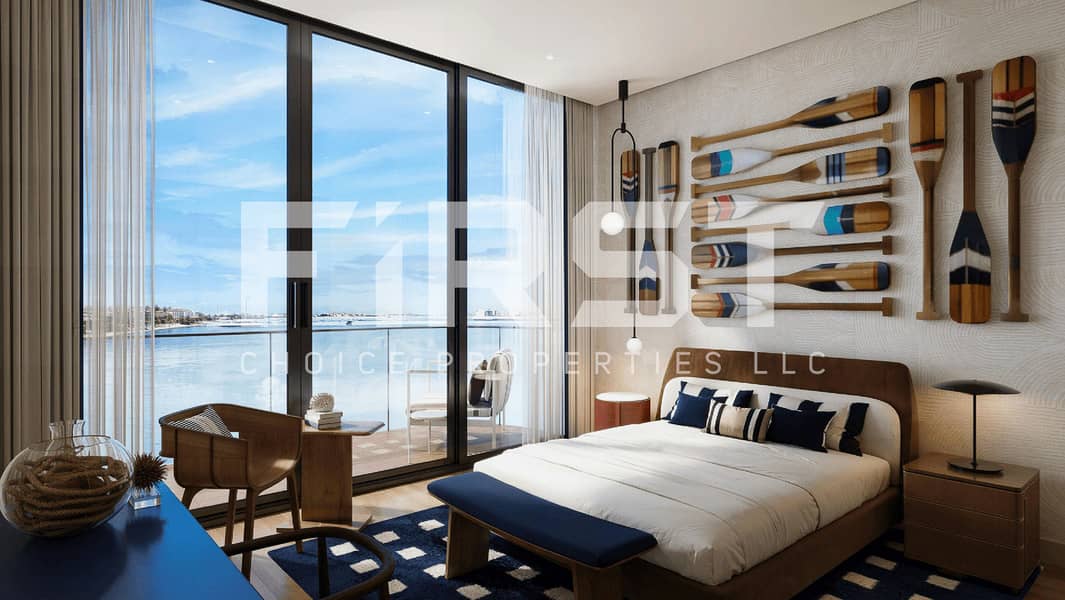 6 Custom walk-in closet in the master suite of a premium Seamount unit in Abu Dhabi with smart storage features and built-in lighting. jpg