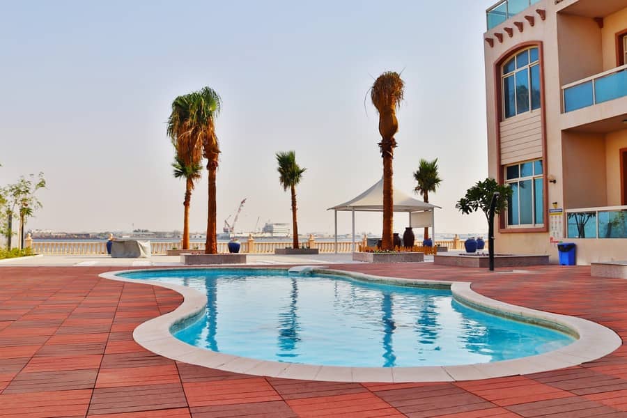 huge and new 2 bedrooms with sea view and swimming pool in between two bridges.