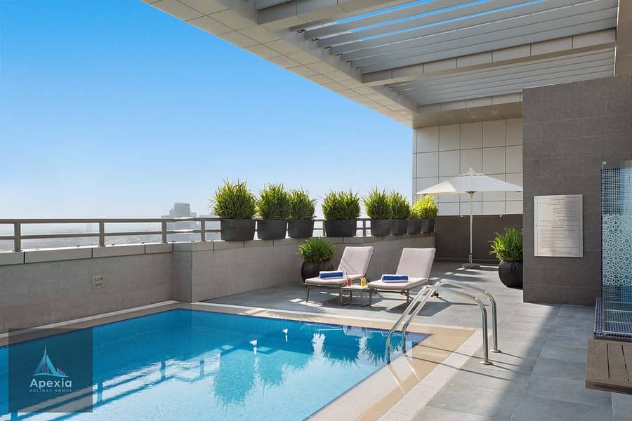 10 hotel-Swimming-Pool-with-Burj-Khalifa-View-2. jpg