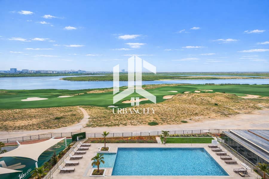 3 Serene poolside view with golf course. png