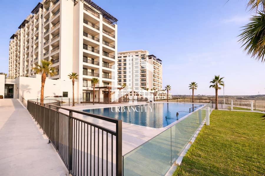 8 Modern poolside oasis at sunset. png