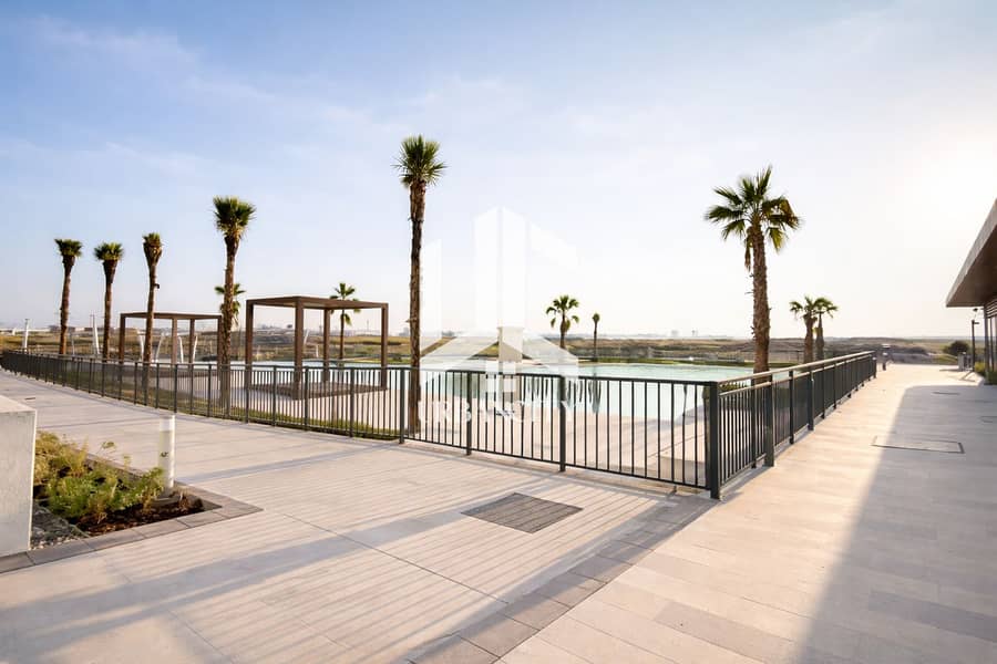11 Poolside promenade with palm trees. png