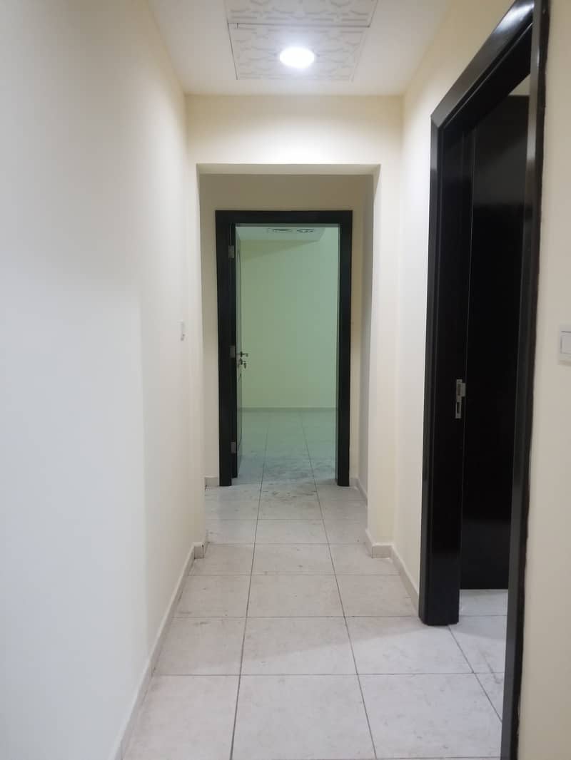 Hot offer 2bhk 2bath in new building with balcony wardrobes central ac in shabiya 47k