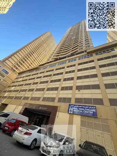 2 Camere Appartamento in Vendita a Emirates City, Ajman - Lilies Tower Cover Pic. jpg 2 Camere Appartamento in Vendita a Emirates City, Ajman - Lilies Tower Cover Pic. jpg
