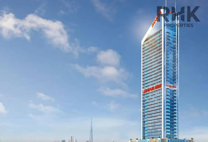 15 Danube Oasis tower exterior in Dubailand with Burj Khalifa skyline view