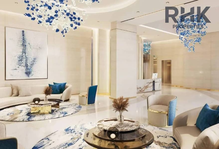 2 Danube Oasis Dubai lobby with blue crystal chandeliers and marble reception in luxury apartments