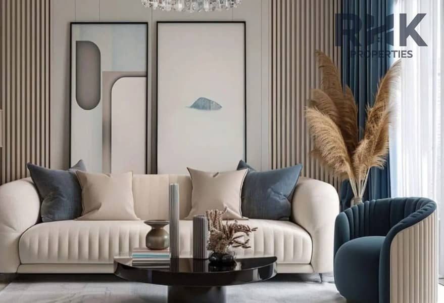 3 Modern living room interior in Danube Oasis Dubailand apartment with beige sofa and blue accent chair