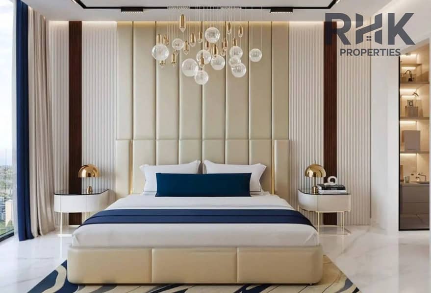 4 Luxury master bedroom in Danube Oasis Dubai with upholstered headboard and gold pendant lighting