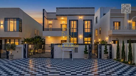 فیلا 4 غرف نوم للبيع في الزاهية، عجمان - Villa_facade_at_sunset_202606140134. jpg فیلا 4 غرف نوم للبيع في الزاهية، عجمان - Villa_facade_at_sunset_202606140134. jpg