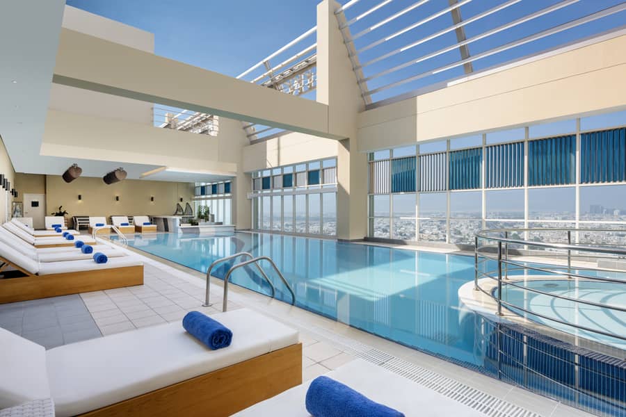 17 Grand_Millenium_AUH_POOL_19892-HDR_2. jpg