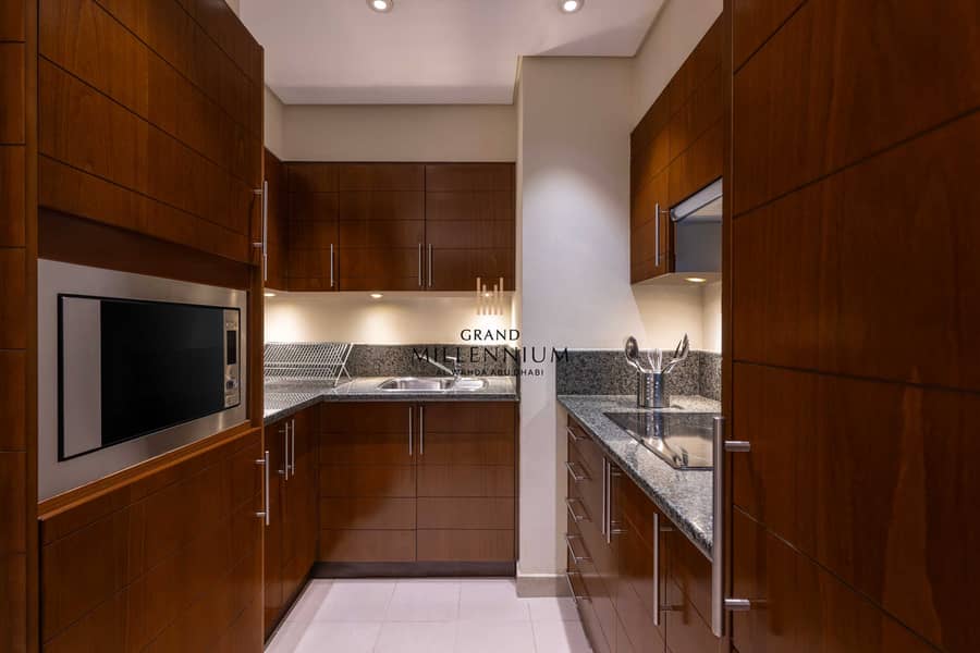 8 Grand_Millenium_AUH_3BR_Apartment_19701-HDR. jpg