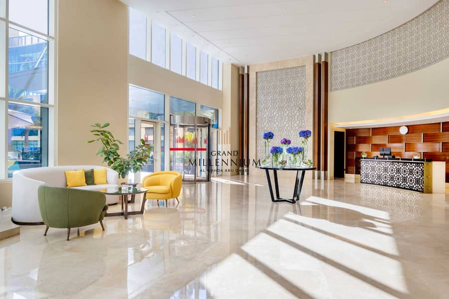 10 Grand_Millenium_AUH_Lobby_21028-HDR_2. jpg