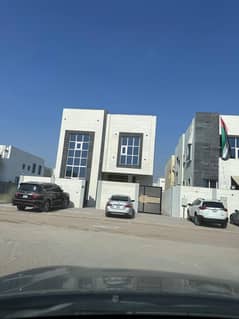 For rent in Al Helio 2: A villa featuring 5 master bedrooms, a majlis, a living area, a maid's room, and a spacious kitchen.