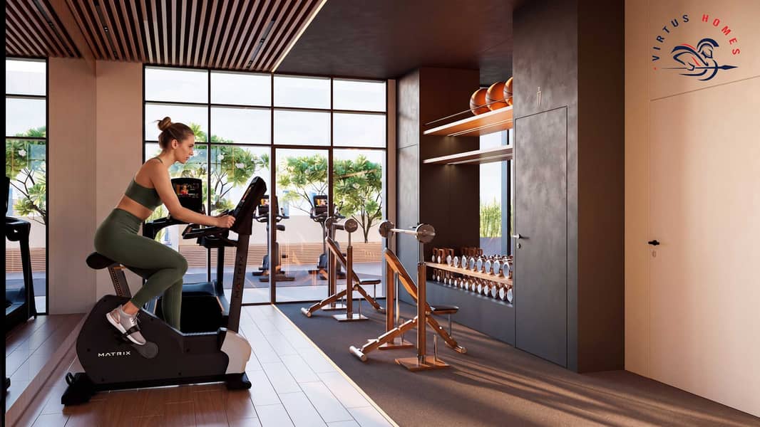 18 Plot 52_Amenities_Gym_01-people. jpg