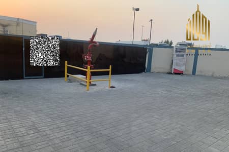 Industrial Land for Sale in Al Jurf, Ajman - Corner industrial plot | Includes a car garage