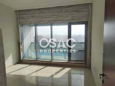 2 Bedroom Apartment for Rent in Sheikh Maktoum Bin Rashid Street, Ajman - High Floor 2BHK | Closed Kitchen | Side Creek View