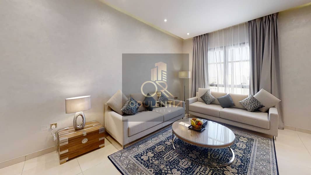 4 A-SUHA-One-Bedroom-Creek-810-Living-Room(1). jpg