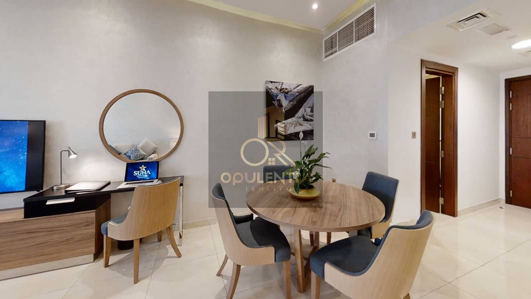 6 A-SUHA-One-Bedroom-Creek-810-Dining-Room. jpg
