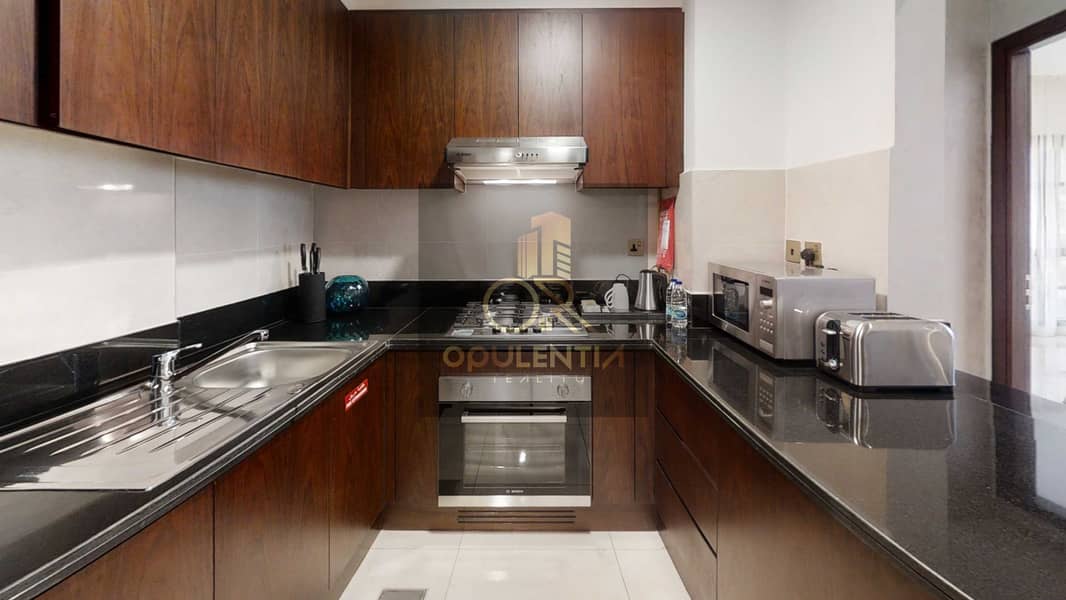 13 A-SUHA-One-Bedroom-Creek-810-Kitchen. jpg