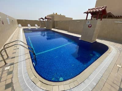 2 Bedroom Flat for Rent in Al Warqaa, Dubai - Swimming pool - 2. jpeg 2 Bedroom Flat for Rent in Al Warqaa, Dubai - Swimming pool - 2. jpeg