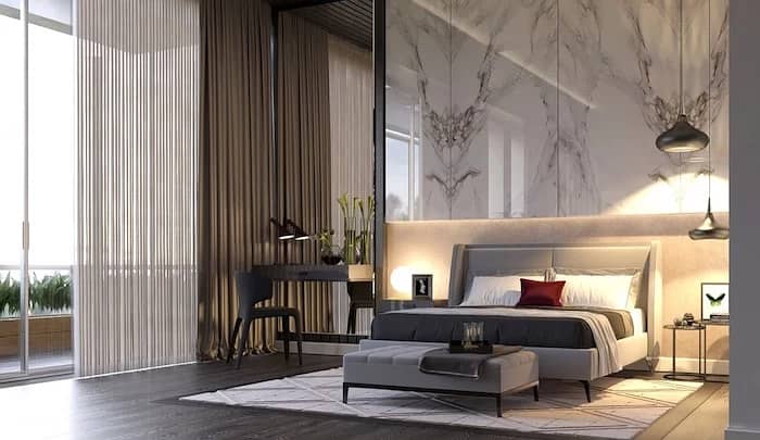 2 pinterest-bedroom-ideas-marble-accent-wall-above-bed-with-white-bed-frame-dark-wooden-floor-with-white-carpet. webp