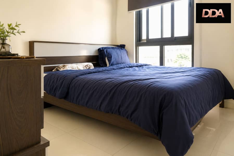3 DAMAC-Hills-Odora-Townhouse-Master-Bedroom-1. png