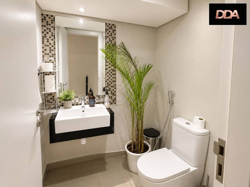 12 DAMAC-Hills-Odora-Townhouse-Guest-Bathroom. png