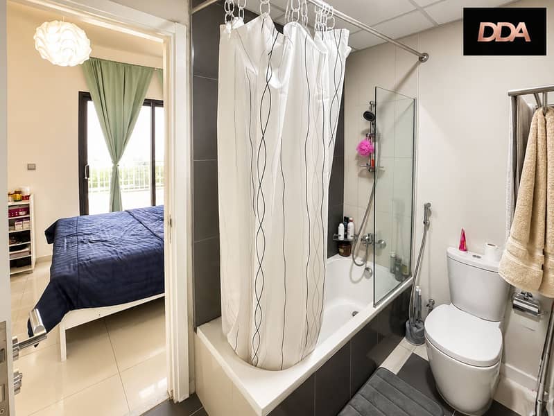 13 DAMAC-Hills-Odora-Townhouse master-Bathroom. png