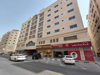 محل تجاري  للايجار في تجارية مويلح، الشارقة - Bldg Pic. JPG