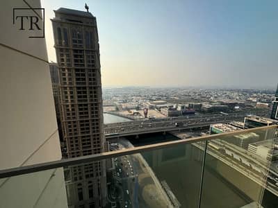 2 Bedroom Flat for Rent in Business Bay, Dubai - Burj & Canal View | Wide Layout | Elegant Finishes