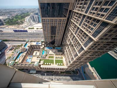 3 Slaapkamers Appartement te Huur in Business Bay, Dubai - Luxury apartment balcony overlooking Al Habtoor City Dubai skyline