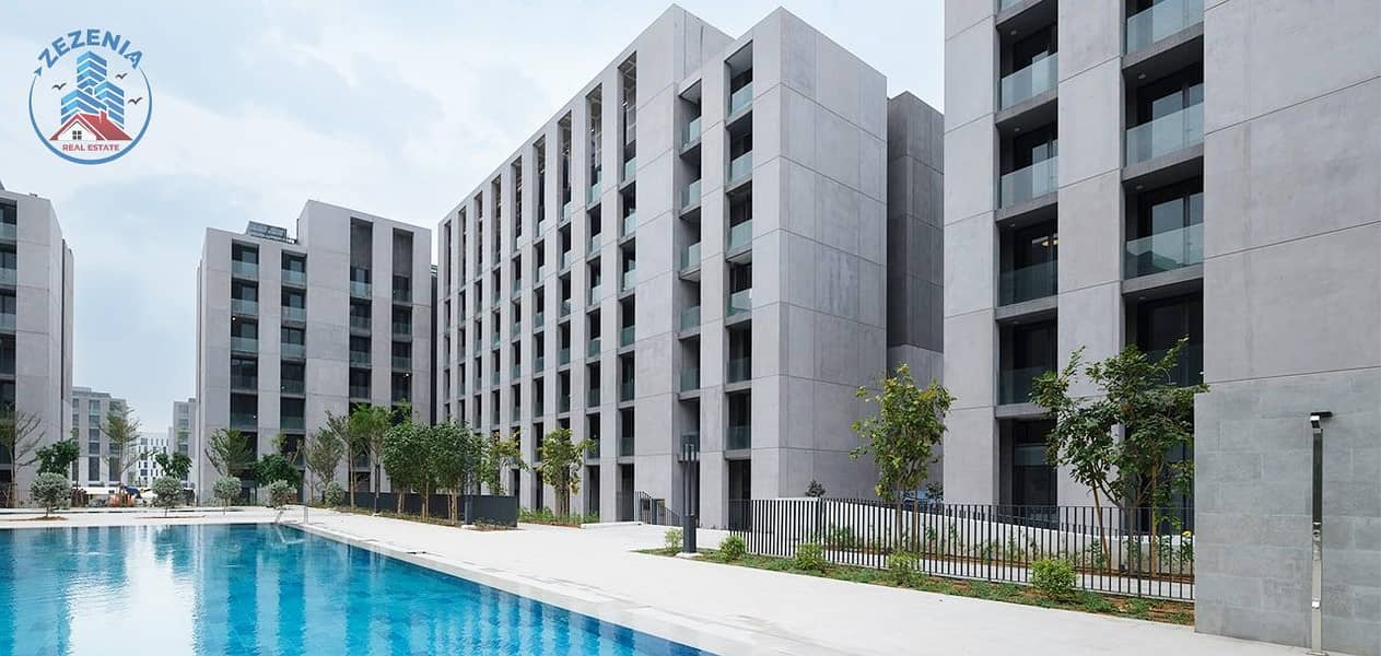 12 The-eight-Tiraz-apartment-blocks-contain-920-homes-banner. jpg