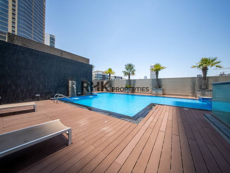 9 Outdoor swimming pool with sun deck, lounge area and resort-style residential amenities