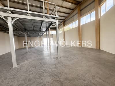 Warehouse for Rent in Dubai Investments Park (DIP), Dubai - Vacant | High Ceiling | 4 Cheques | 10KW