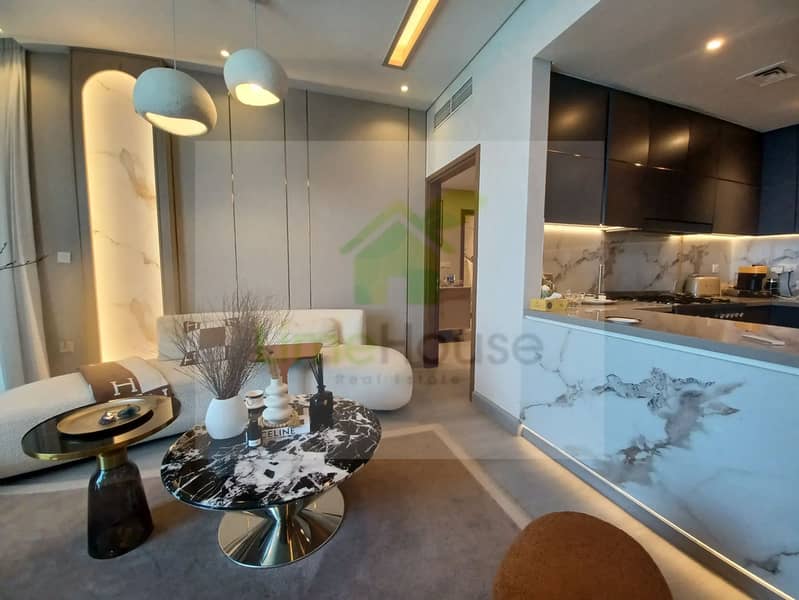 5 3-bedroom-apartment-5242-dubai-marina-living-room-kitchen-modern-design-marble-finishes. webp