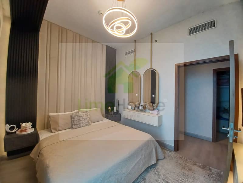 14 3-bedroom-apartment-5242-dubai-marina-bedroom-modern-chandelier-padded-headboard-2. webp
