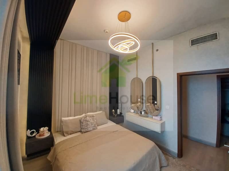 15 3-bedroom-apartment-5242-dubai-marina-bedroom-modern-chandelier-padded-headboard-3. webp