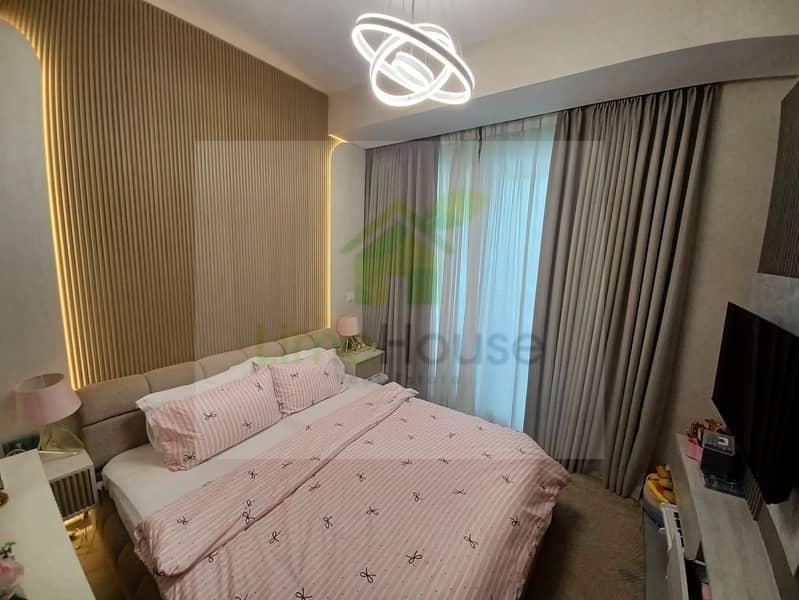 25 3-bedroom-apartment-5242-dubai-marina-bedroom-wood-panel-wall-modern-light. webp