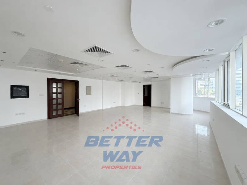 9 08-main-office-curved-windows-c. png