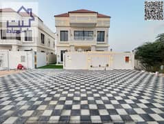 For rent: Classic villa, Al Helio 2, Ajman, first occupancy (two floors and a roof) at a good price in 4 installments
