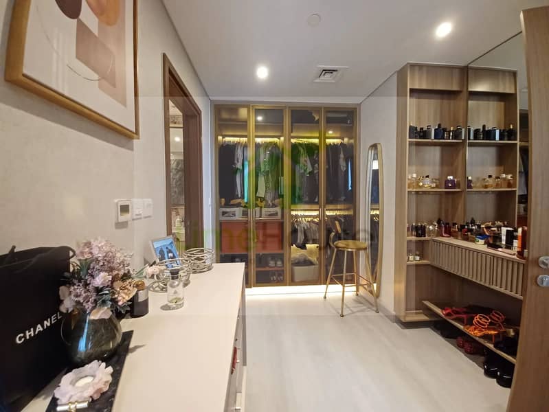 15 3-bedroom-apartment-5242-dubai-marina-walk-in-closet-glass-wardrobes-vanity. webp