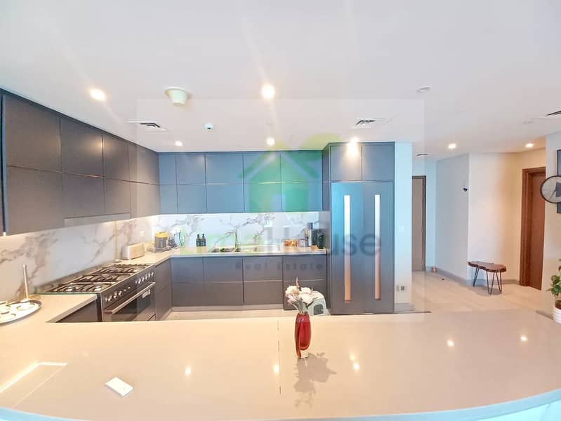 30 3-bedroom-apartment-5242-dubai-marina-kitchen-modern-marble-island. webp