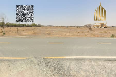 Plot for Sale in Al Manama, Ajman - Land in Manama area, block13, close to the road Plot for Sale in Al Manama, Ajman - Land in Manama area, block13, close to the road