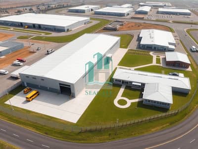 Warehouse zum Miete in Al Sajaa, Sharjah - Ultra_detailed_aerial_drone_photo_of_an_industrial_facility_campus_landscape_orientation. _Foreground_a_large_modern_warehouse_building_with_light_gray_metal_siding_and_a_bright_white_roof_long_loading_bay_facade_with. jpeg