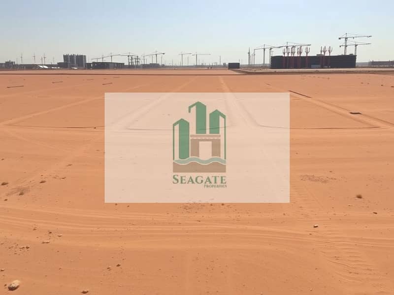 2 A_panoramic_view_of_an_empty_industrial_site_in_the_UAE_featuring_a_vast_leveled_sandy_terrain_marked_with_faint_boundary_lines. _The_ground_appears_dry_and_flat_with_scattered_patches_of_sparse_vegetation. _In_the_bac. jpeg