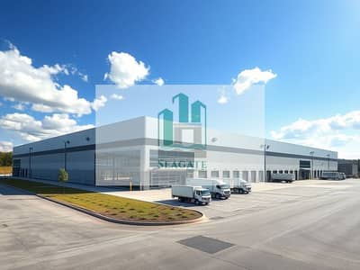 Warehouse zum zum Verkauf in Ajman Industrial, Ajman - A_full_exterior_view_of_a_large_warehouse_building. _The_architecture_features_a_modern_design_with_a_sleek_metallic_exterior_large_glass_windows_and_several_loading_docks. _Surrounding_the_warehouse_is_a_spacious_pave. jpeg Warehouse zum zum Verkauf in Ajman Industrial, Ajman - A_full_exterior_view_of_a_large_warehouse_building. _The_architecture_features_a_modern_design_with_a_sleek_metallic_exterior_large_glass_windows_and_several_loading_docks. _Surrounding_the_warehouse_is_a_spacious_pave. jpeg