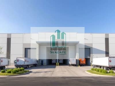 مستودع  للايجار في مدينة الإمارات الصناعية، الشارقة - An_exterior_view_of_a_modern_warehouse_building_showcasing_its_large_entrance_with_roll_up_doors. _The_structure_features_a_flat_roof_wide_loading_docks_and_ample_parking_space_for_delivery_trucks. _Surrounding_the_war. jpeg