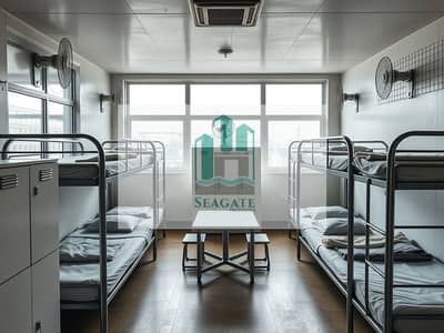 Labour Camp para en Alquiler en Industrial Area, Sharjah - A_functional_and_practical_design_for_a_labor_camp_dormitory_in_an_industrial_location. _The_room_should_accommodate_six_people_featuring_three_sets_of_metal_bunk_beds. _The_design_is_utilitarian_with_durable_materials. jpeg Labour Camp para en Alquiler en Industrial Area, Sharjah - A_functional_and_practical_design_for_a_labor_camp_dormitory_in_an_industrial_location. _The_room_should_accommodate_six_people_featuring_three_sets_of_metal_bunk_beds. _The_design_is_utilitarian_with_durable_materials. jpeg