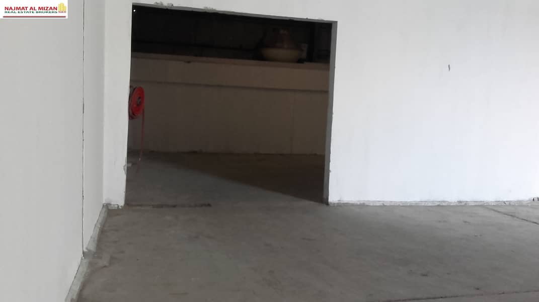 Commercial Warehouse, 2,000 SQFT; Insulated, Good height; 15 kw power ; small pantry  & Roilet Rent in DIP (Aed. 50,000/- )